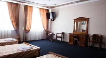 Фото номера Стандартный двухместный номер с 2 отдельными кроватями Гостиница Метрополь г. Махачкала 4