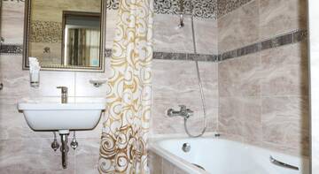 Фото номера Двухместный номер Делюкс с 1 кроватью Гостиница Admiral Hotel г. Махачкала 33